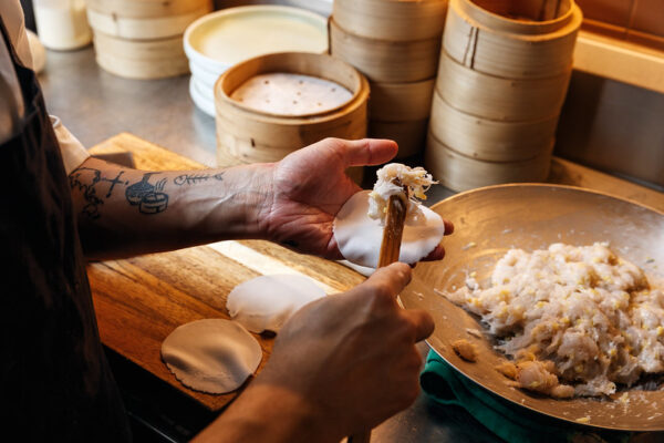 Chef making hand made dumplings.